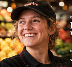 Conceptual portrait representing a friendly grocery employee
